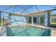 Relaxing screened pool and patio area, perfect for outdoor entertaining at 10643 Old Grove Cir, Bradenton, FL 34212