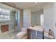 Clean bathroom with shower, toilet and modern vanity at 1350 Main St # 600, Sarasota, FL 34236