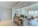 Modern open-plan kitchen with island and living area view at 1350 Main St # 600, Sarasota, FL 34236