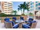 Outdoor patio with fire pit and comfortable seating at 1350 Main St # 600, Sarasota, FL 34236