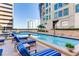 Relaxing pool area with comfortable seating and city views at 1350 Main St # 600, Sarasota, FL 34236