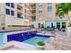 Stunning pool and spa area with blue tile accents at 1350 Main St # 600, Sarasota, FL 34236