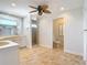 Bright bathroom featuring a shower, toilet, and sink at 4440 Tatum St, Port Charlotte, FL 33948