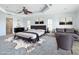 Elegant main bedroom with sitting area, dark furniture, and stylish decor at 4440 Tatum St, Port Charlotte, FL 33948