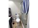 Clean bathroom with shower/tub combo and white toilet at 6312 7Th W Ave # 6312, Bradenton, FL 34209