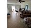 Spacious living room with tile floors and a Christmas tree at 6312 7Th W Ave # 6312, Bradenton, FL 34209