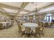 Grand banquet hall with chandeliers and ample seating for events at 6836 Bay Hill Dr, Bradenton, FL 34202