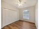 Spacious bedroom with hardwood floors and large closet at 6836 Bay Hill Dr, Bradenton, FL 34202