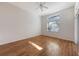 Spacious bedroom with wood-look flooring and ceiling fan at 6836 Bay Hill Dr, Bradenton, FL 34202