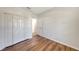 Well-lit bedroom with hardwood floors and ample closet space at 6836 Bay Hill Dr, Bradenton, FL 34202