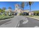 Luxurious clubhouse entrance with palm trees at 6836 Bay Hill Dr, Bradenton, FL 34202