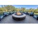 Outdoor fire pit surrounded by comfortable seating, perfect for relaxation at 6836 Bay Hill Dr, Bradenton, FL 34202