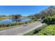 Landscaped path alongside a pond on the golf course at 6836 Bay Hill Dr, Bradenton, FL 34202