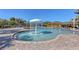 Resort-style pool with mushroom fountain at 6836 Bay Hill Dr, Bradenton, FL 34202