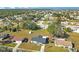 Aerial view of a residential neighborhood with a single-Gathering home highlighted at 7555 Hanchey St, North Port, FL 34287