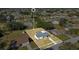 Aerial view of a single-Gathering home with a large lot in a residential neighborhood at 7555 Hanchey St, North Port, FL 34287