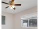 Bright bedroom with ceiling fan and window blinds at 7555 Hanchey St, North Port, FL 34287