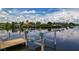 Private dock with functioning boat lift, perfect for water access at 4440 Tatum St, Port Charlotte, FL 33948