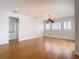 Bright bonus room with hardwood floors and ceiling fan at 4440 Tatum St, Port Charlotte, FL 33948