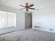 Main bedroom with access to a private balcony at 4440 Tatum St, Port Charlotte, FL 33948