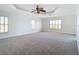 Main bedroom with tray ceiling and carpet at 4440 Tatum St, Port Charlotte, FL 33948