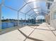 Enclosed pool and spa overlooking the waterway at 4440 Tatum St, Port Charlotte, FL 33948