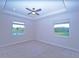 Spacious bedroom with carpet flooring and ceiling fan at 16721 Barnwood Pl, Bradenton, FL 34211