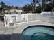 Relax in this community hot tub, with spa rules visible and depth marked, near grilling areas for convenience at 4320 47Th W Ave # 203, Bradenton, FL 34210