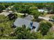 Aerial view of the home showcasing its mature landscaping and neighborhood at 5373 Dominica Cir, Sarasota, FL 34233