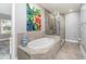 Spa-like bathroom featuring a soaking tub and walk-in shower at 7840 34Th W Ave # 103, Bradenton, FL 34209