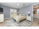 Bright bedroom with a comfortable bed and en-suite bathroom access at 7840 34Th W Ave # 103, Bradenton, FL 34209