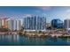 Aerial view of luxury waterfront building in vibrant city at 1155 N Gulfstream Ave # 703, Sarasota, FL 34236