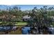 Single-story home with a large backyard and water view at 128 51St Street E Cir # 7, Palmetto, FL 34221