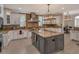 Large kitchen island with granite countertops and seating at 2412 Bay Dr W Ave, Bradenton, FL 34207