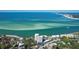 Aerial view of waterfront property, showcasing building and waterway at 4822 Ocean Blvd # 10E, Sarasota, FL 34242