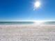 Peaceful beach scene with white sand and blue water at 4822 Ocean Blvd # 10E, Sarasota, FL 34242