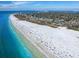 Aerial view of expansive beach with people at 4822 Ocean Blvd # 10E, Sarasota, FL 34242