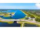 Aerial view of lake and surrounding community at 4990 Baraldi Cir # 101, Sarasota, FL 34235