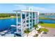 Aerial view of modern building with lake access at 4990 Baraldi Cir # 101, Sarasota, FL 34235