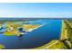 Aerial view of the lake and surrounding community at 4990 Baraldi Cir # 101, Sarasota, FL 34235