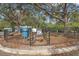 Fenced dog park with waste disposal at 4990 Baraldi Cir # 101, Sarasota, FL 34235