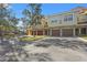 Townhomes with attached garages and parking area at 4990 Baraldi Cir # 101, Sarasota, FL 34235