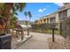 Community grills and a pathway at 4990 Baraldi Cir # 101, Sarasota, FL 34235