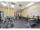 Community gym with weight machines and mirrors at 4990 Baraldi Cir # 101, Sarasota, FL 34235