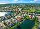 Aerial view of the house and surrounding neighborhood at 521 Luminary Blvd, Osprey, FL 34229