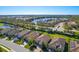 Aerial view of homes and community lake at 6870 Willowshire Way, Bradenton, FL 34212