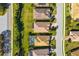 Overhead view of homes with well-kept lawns and convenient street access in a beautifully planned community at 6870 Willowshire Way, Bradenton, FL 34212