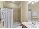 Clean bathroom with shower/tub combo and updated vanity at 6870 Willowshire Way, Bradenton, FL 34212