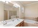 Double vanity bathroom with a soaking tub and walk-in shower at 6870 Willowshire Way, Bradenton, FL 34212