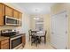 Kitchen nook with table and chairs, perfect for casual dining at 6870 Willowshire Way, Bradenton, FL 34212